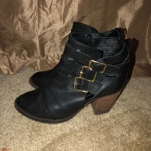 Women’s black and gold boots
